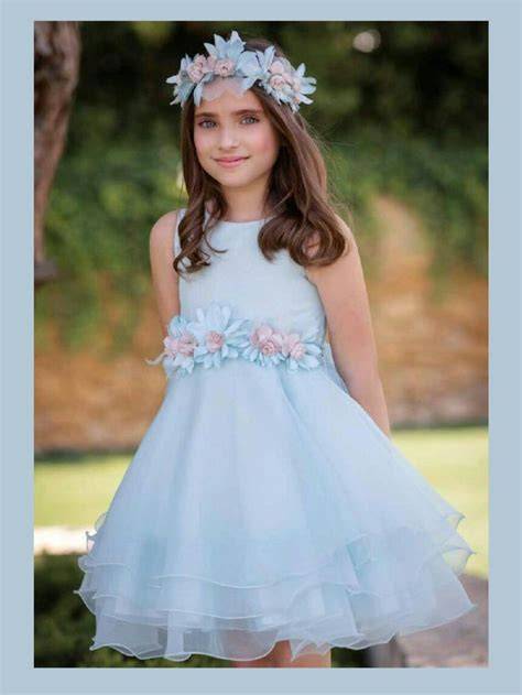 Collezione di abiti da damigella bambina turchese con dettagli floreali