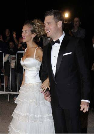 Luisana Lopilato e Michael Bublé in abiti da sposa