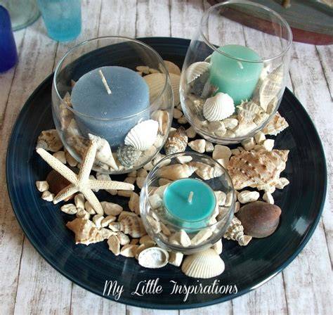 esempio di centrotavola con conchiglie e candele