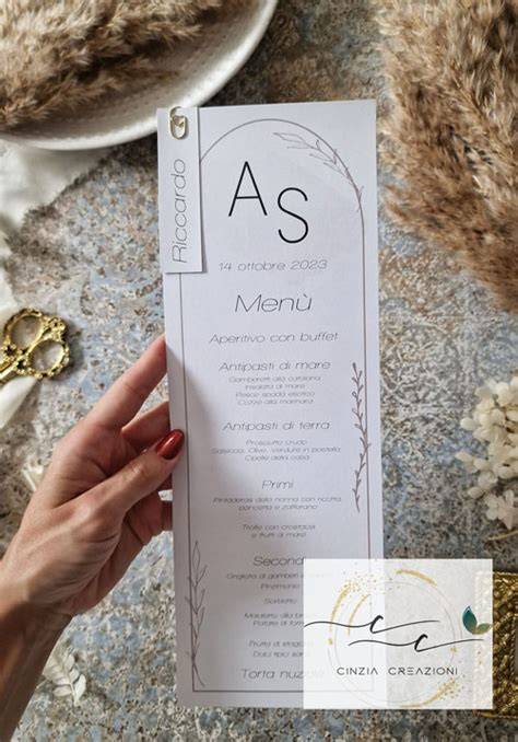 Esempi di coordinato grafico matrimonio: partecipazioni, menu, segnaposto