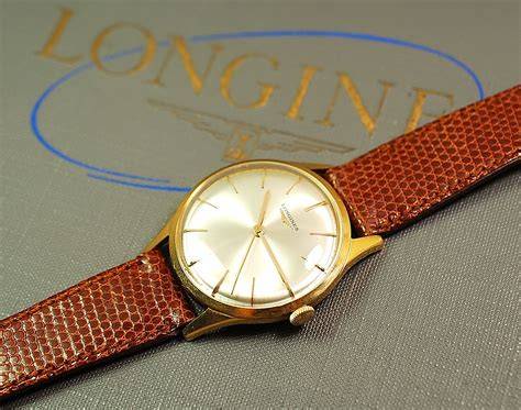 Orologi classici in oro per coppia