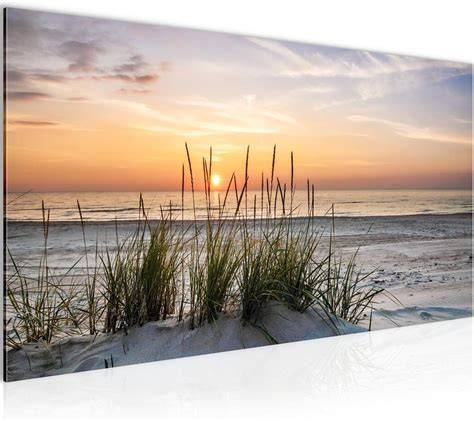 Tramonto sulla Versilia con locali sulla spiaggia