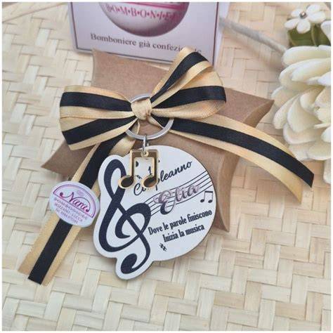 Bomboniere matrimonio a tema musica: compilation, apribottiglia chiave di violino, biscotti decorati