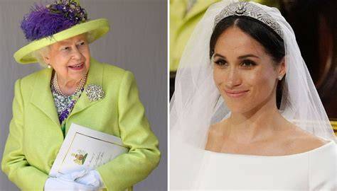 Dettaglio dell'abito da sposa di Meghan Markle con ricami floreali del Commonwealth