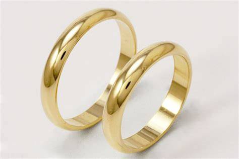 Fedi nuziali classiche in oro giallo
