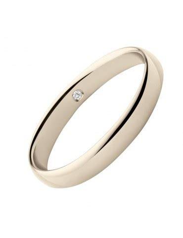 Fede nuziale in oro champagne con texture naturale