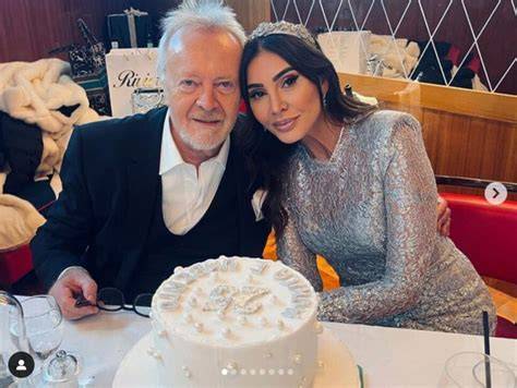 Umberto Tozzi e Monica Michielotto con torta celebrativa