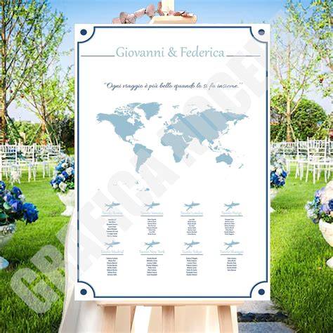 Dettaglio di un tableau mariage a tema viaggio con cornici portafoto