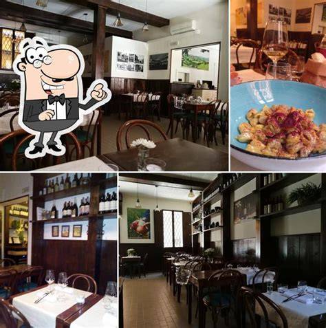 Interno dell'Antica Osteria Le Mura con arredamento rustico e raffinato