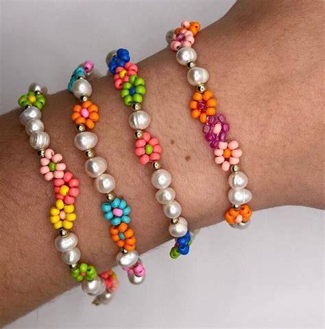 Braccialetti con fiori d'ulivo e rosmarino