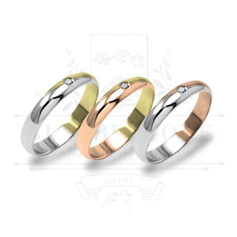 Design di fedi nuziali in oro giallo, oro bianco, oro rosa e con diamanti